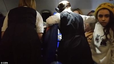 زوجة برلماني روسي تهين امرأة بسبب كوب عصير (فيديو)