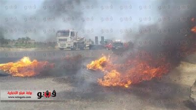 بالصور.. مجهولون يشعلون النيران في إطارات السيارات بكفر الشيخ