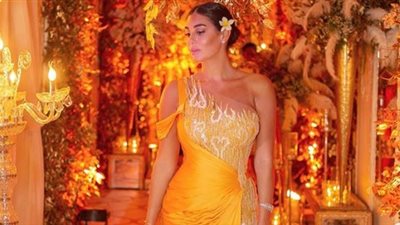 ياسمين صبري بإطلالة ذهبية جذابة في أحدث جلسة تصوير