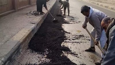 رصف الطريق أسفل كوبري الساحل بالجيزة | صور