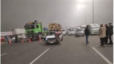 المرور تجرى أعمال تفويج للسيارات بطريقي 