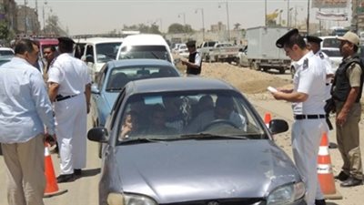 مرور الجيزة يحرر 1035 انتظارا خاطئا أعلى الطريق السريع