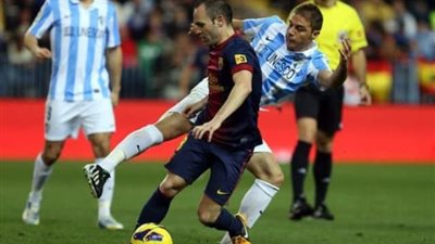 برشلونة يعزز صدارته للدوري الإسباني بثنائية في مالاجا