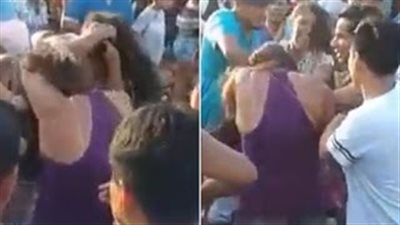 بالفيديو.. امرأة تكتشف خيانة زوجها في مهرجان ديني