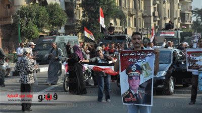 بالفيديو والصور.. سيدة ترقص على أنغام 