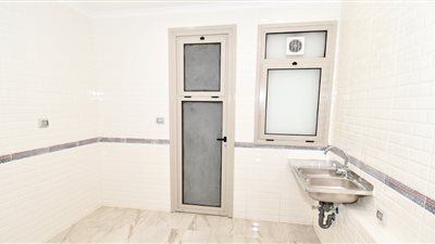 أعمال تشطيب الوحدات السكنية بحى جاردن سيتى بالعاصمة الإدارية (صور)