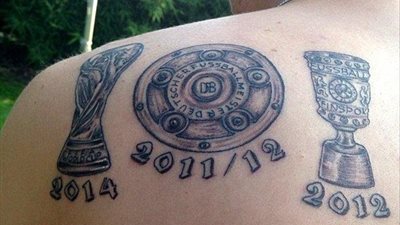 بالصورة..لاعب ألمانيا يخلد الثلاثية التاريخية بوشم على ظهره
