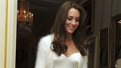 ميجان ماركل تسير على خطى كيت ميدلتون في فستان الزفاف