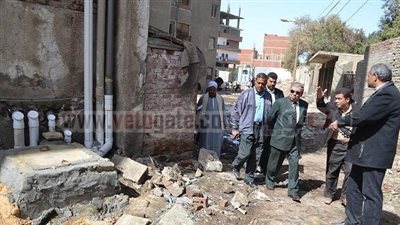 بالصور.. ترميم عمارات الإيواء بـ