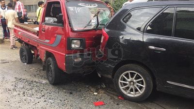 تصادم 10 سيارات أعلى كوبري الدقي بسبب الأمطار (صور)