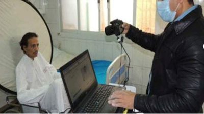 الأحوال المدنية تجدد الرقم القومي للمرضى وذوي الاحتياجات بمنازلهم |صور