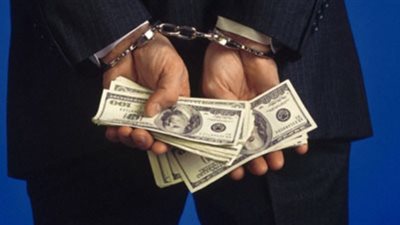 سقوط سمسارة تنصب على المواطنين بالدولارات المزيفة بأسيوط