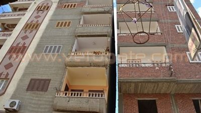السكان يمتنعون عن إخلاء عمارة سكنية بها ميل بكفر الشيخ
