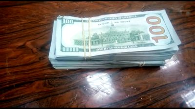 ضبط 20 ألف دولار بمناطق حساسة لراكب متجه إلى السودان