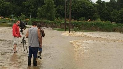 بالصور.. الفيضانات تغطي شوارع ولاية «إلينوي» الأمريكية