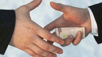 ضبط مسئول الشئون القانونية بجهاز مدينة العبور متلبسًا بالرشوة