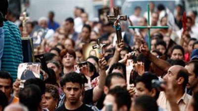 الأقباط يشكلون لجانًا شعبية أمام كنيسة القديسين بعزبة النخل