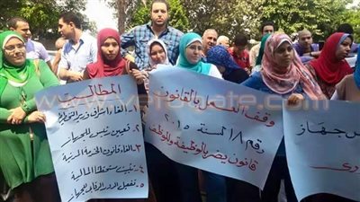 بالصور.. إضراب العاملين بـ«التنظيم» عن العمل