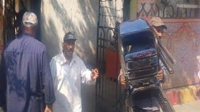 التحفظ على 1600 كرسي و15 إعلانا بدون ترخيص في حملة أمنية بالجيزة