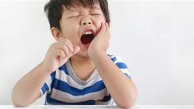 ٧ أعراض لتسوس أسنان الأطفال