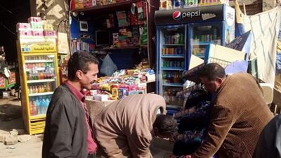 رفع تندات وغلق محال بدون ترخيص في حملة مكبرة بالجيزة