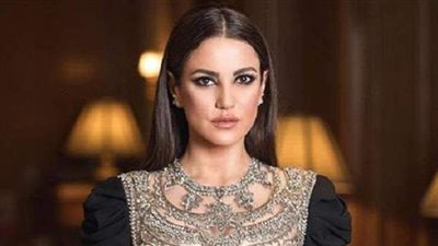 درة تتألق بالأحمر في أحدث جلسة تصوير