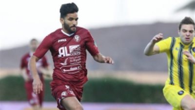 صالح جمعة على دكة الفيصلي في نهائي كأس خادم الحرمين