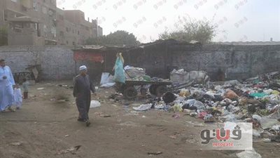 بالصور.. القمامة تمنع المواطنين بشبرا الخيمة من الاحتفال بالعيد