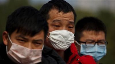 امرأة صينية تصنع 600 كمامة بسبب 