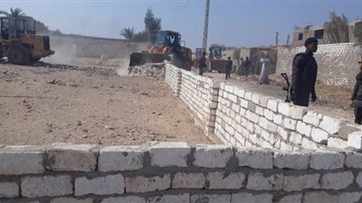 استعادة 335 فدانا وإزالة 192 مبنى مخالف بقنا | صور