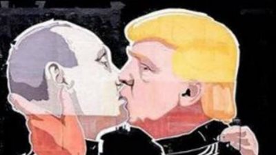 بالصور.. جرافيتي قبلات ساخنة بين «بوتين» و«ترامب» على جدار مطعم ليتواني