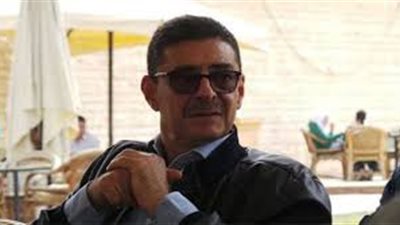 بالصور.. محمود طاهر يكرم السباح أحمد أكرم