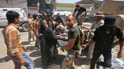 انتحاري متنكر بزي امرأة يقتل 14 شخصًا بالعراق