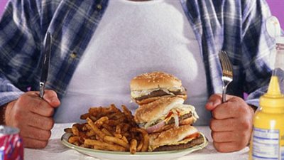 الخلايا المناعية في المخ تدفع نحو الإفراط في تناول الطعام وزيادة الوزن