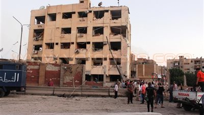 حي غرب شبرا يفحص المباني المتضررة من تفجير مبنى الأمن الوطني