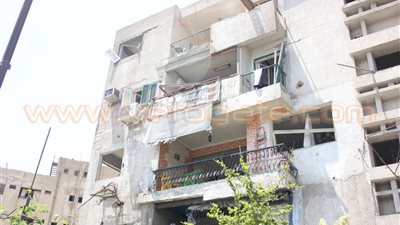 بالصور.. تحطم المنازل والمعهد الأزهري جراء انفجار مبنى الأمن الوطني