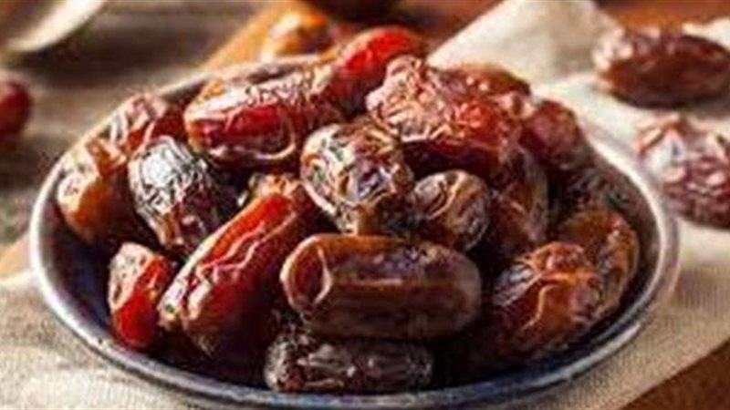 تفسيررؤية شراء التمر