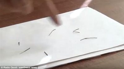 امرأة تكتشف إبرا في جسد طفلها (فيديو وصور)