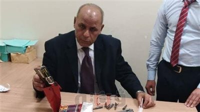 ضبط أمريكي حاول تهريب 21 طلقة نارية بمطار القاهرة (صور)