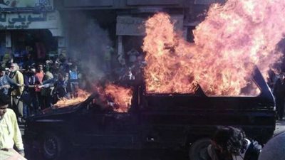 أنباء عن إشعال أنصار الإرهابية النيران بسيارة شرطة بـ«المريوطية»