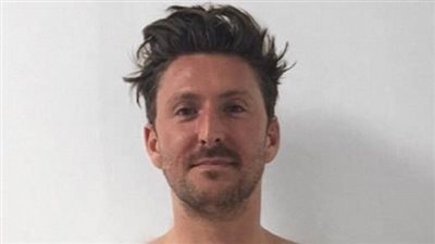 مصمم أزياء يحصل على جسد مثالي في 12 أسبوعا (صور)