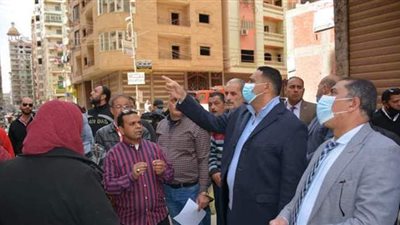 كردون أمني وإخلاء فوري لعقار المنصورة المائل