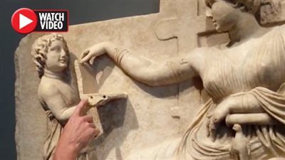 تمثال عمره 2500 عام يحمل «لاب توب»