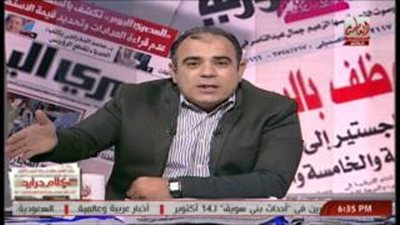 بالفيديو.. «مذيع العاصمة» يدافع عن رئيس الحكومة بسبب صورته مع «فودة»