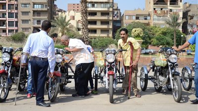 بالصور.. تضامن القاهرة: تسليم ٤٨ دراجة بخارية لذوي الإعاقة