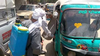 تعقيم مواقف السيارات والمنشآت الخدمية بملوي في المنيا