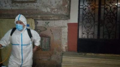 رش وتطهير حارة أبو عوف وشارعي زغلول وماهر بالجيزة لمواجهة كورونا | صور