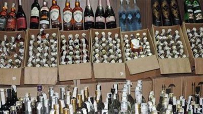 مصادرة 528 زجاجة مشروبات كحولية مجهولة المصدر بحدائق حلوان