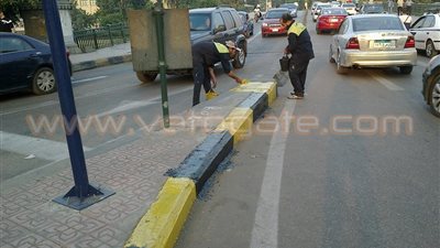 بالصور.. حملة نظافة موسعة بميدان الدقي استعدادًا للعيد