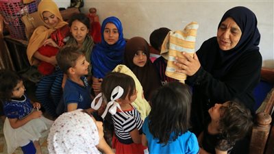 قصة مسنة عراقية ترعى 22 حفيدا قتل تنظيم داعش آباءهم